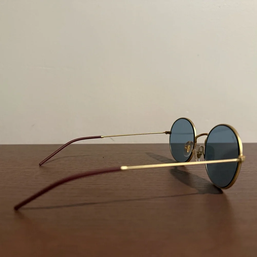 Ray-Ban Gold Frame Sunglasses with Black Lenses